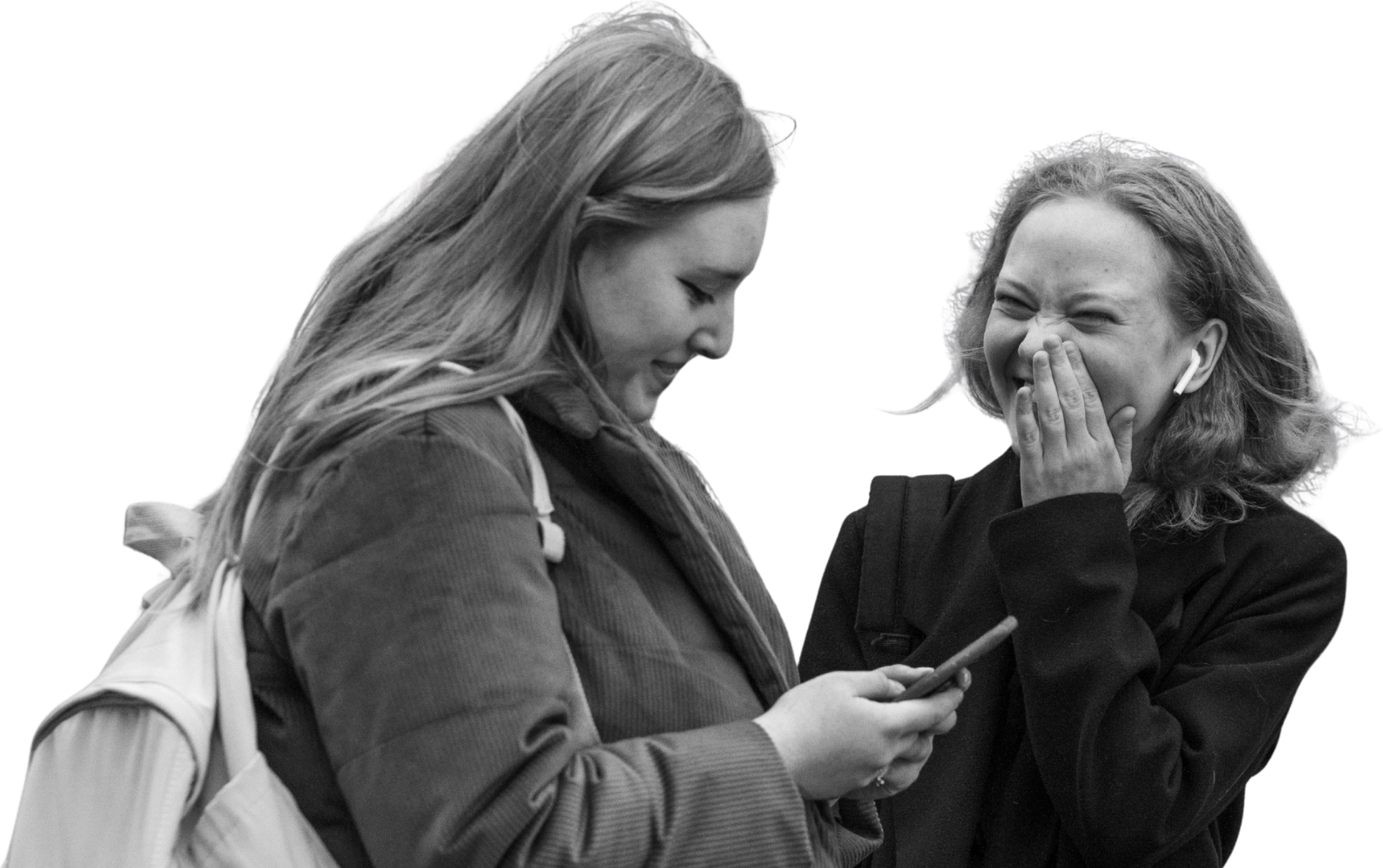 Friends laughing at a phone