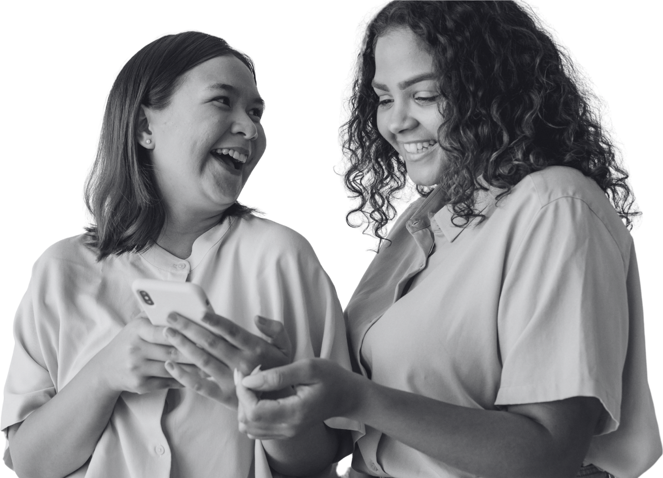 Two sisters laughing at a phone